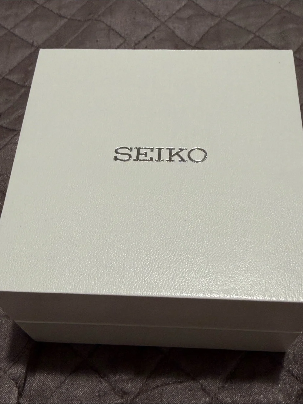 Seiko Stainless Steel Watch with Green Dial and Silver Bezel